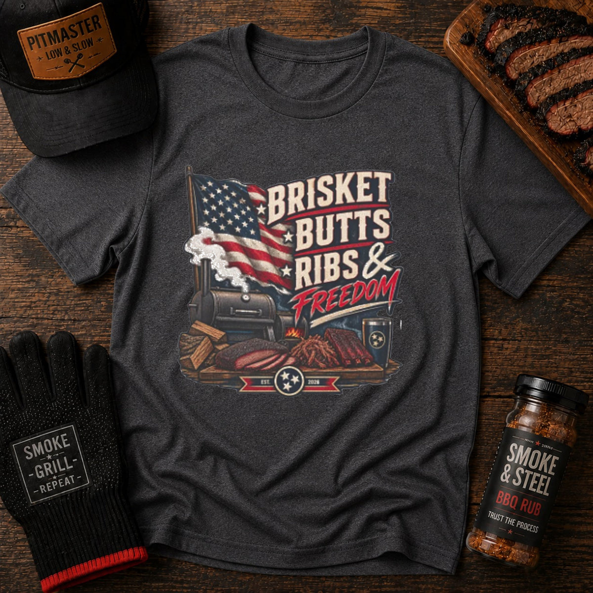 Brisket, Butts, Ribs & Freedom BBQ t-shirt with vintage American flag and smoker graphic
